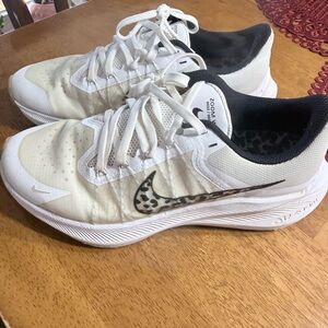 Nike Women’s White Running Shoes with Leopard Swoosh Accent